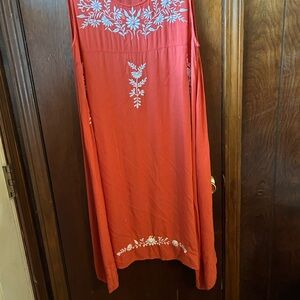 Coral Dress in XXL but bust measurements  of 44” reflect a large.